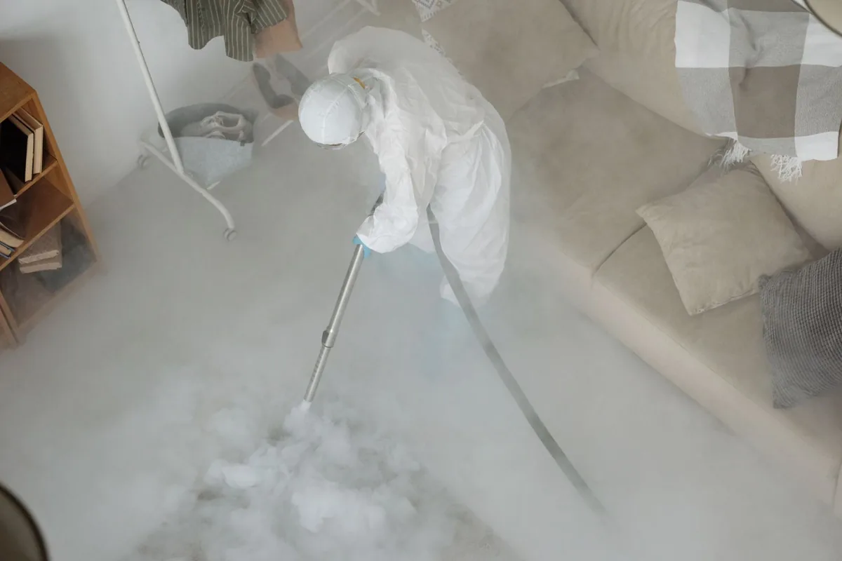 Biohazard cleanup technician in protective equipment, Alderwood Manor, WA